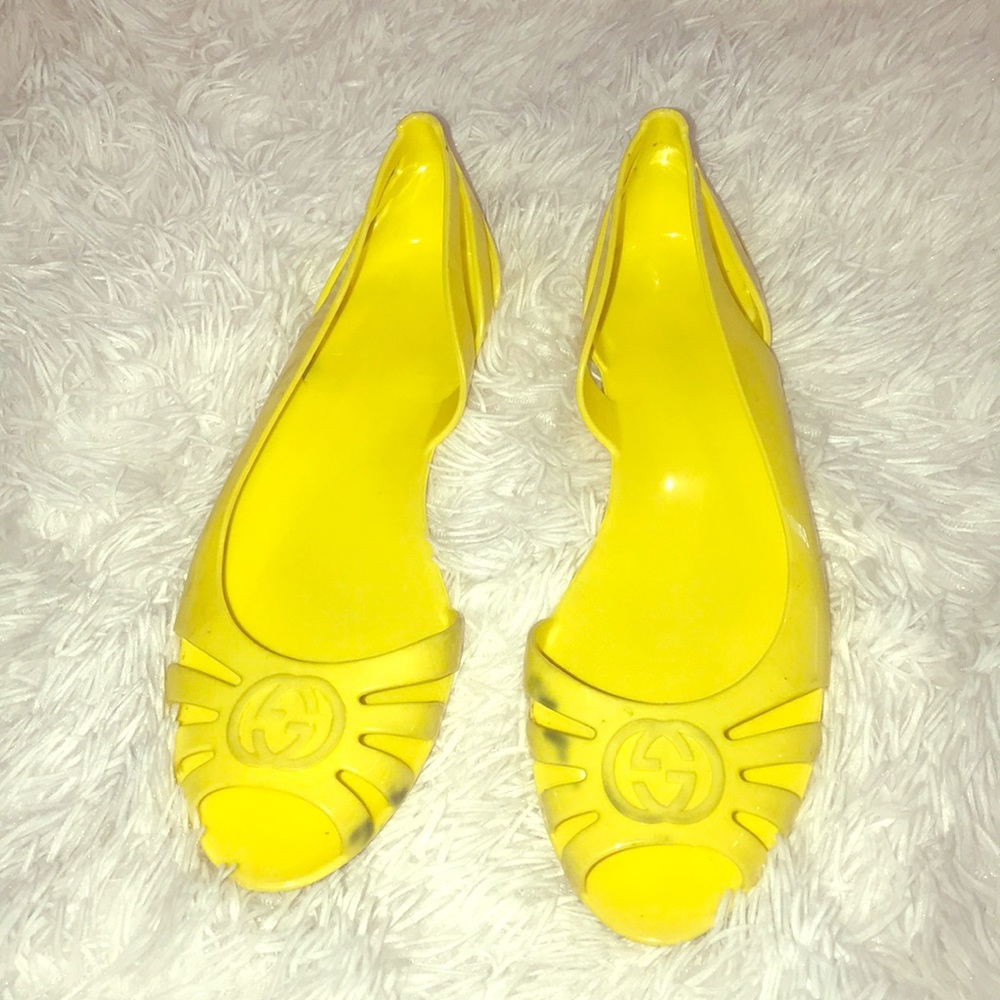 Gucci jelly flat sandals with GG logo